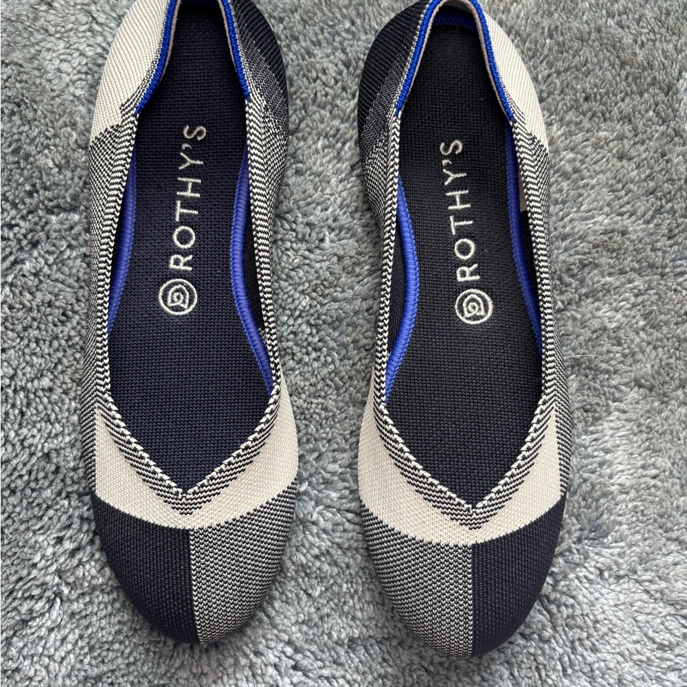 Rothy's Black and Cream Flats with Blue Accents